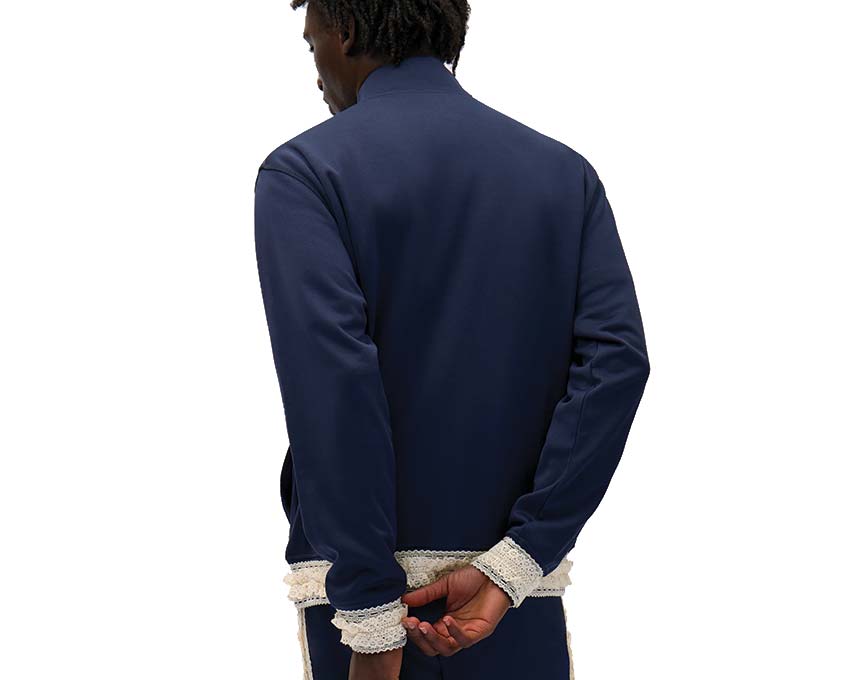 Arte Trim Jacket Navy vue latérale — détail bandes trim