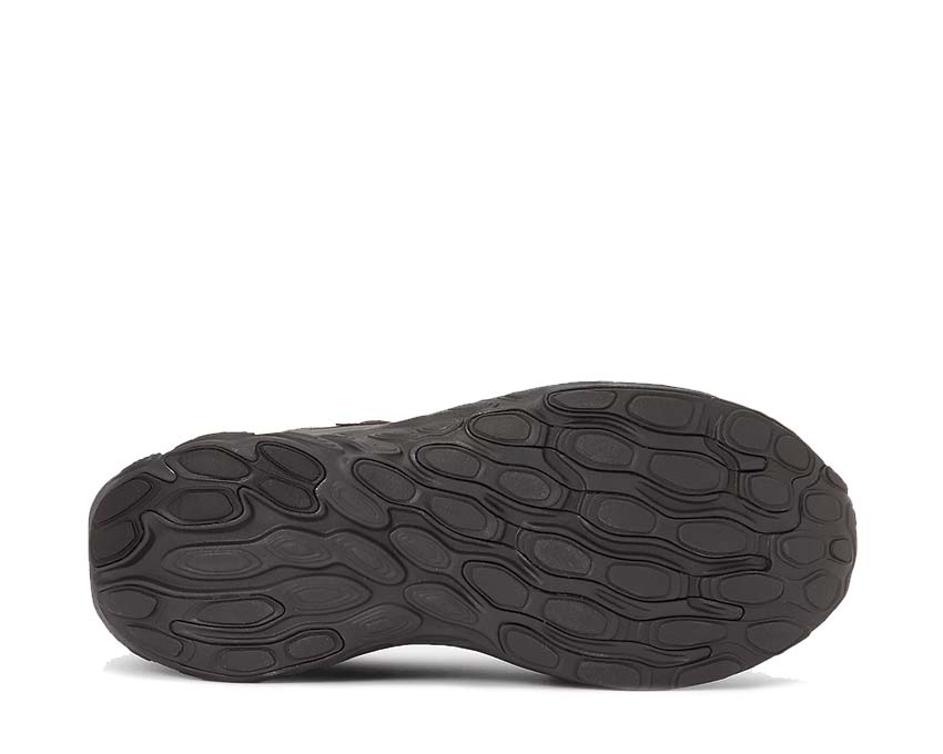 New Balance Fresh Foam Trainer Black Cement detail — reinforced black overlay upper