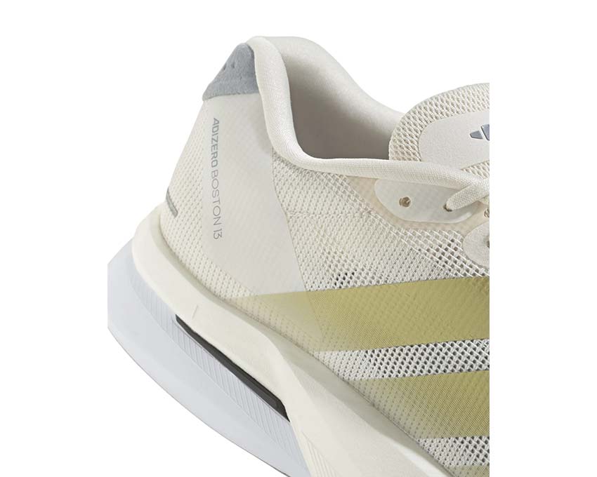 Adidas Adizero Boston 13 Gold Metallic vista lateral — placa Energyrods 2.0