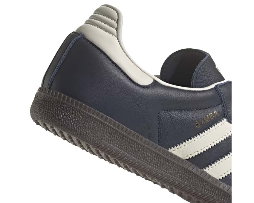 Adidas Samba OG Night Navy vista lateral — banda blanca sobre marino