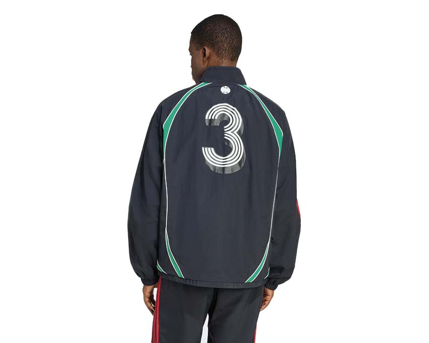 Adidas Teamgeist Moto Tracktop détail — fermeture zippée et imprimé graphique