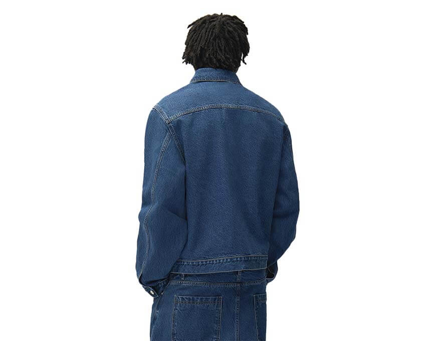 Arte Fold Pocket Denim Jacket détail — poches pliées et coutures signature