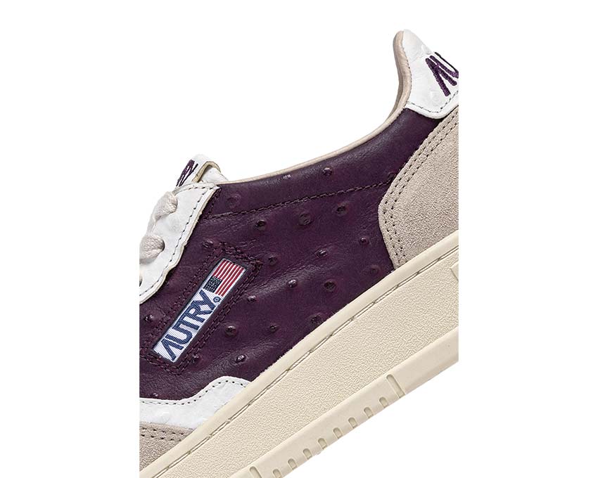 Autry Medalist Low vue latérale — cuir premium bicolore sport