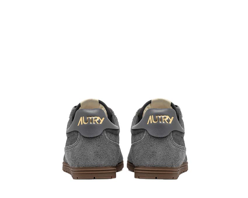 Autry Windspin Low Avion détail — perforations daim bleu