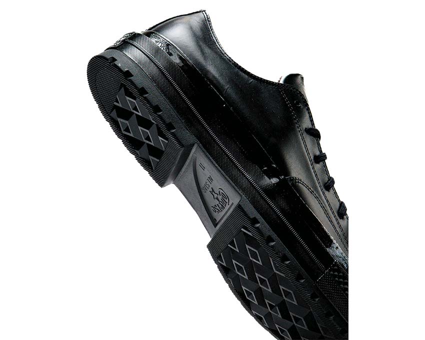 Converse Chuck 70 National OX Black vue latérale — profil low toile noire mat