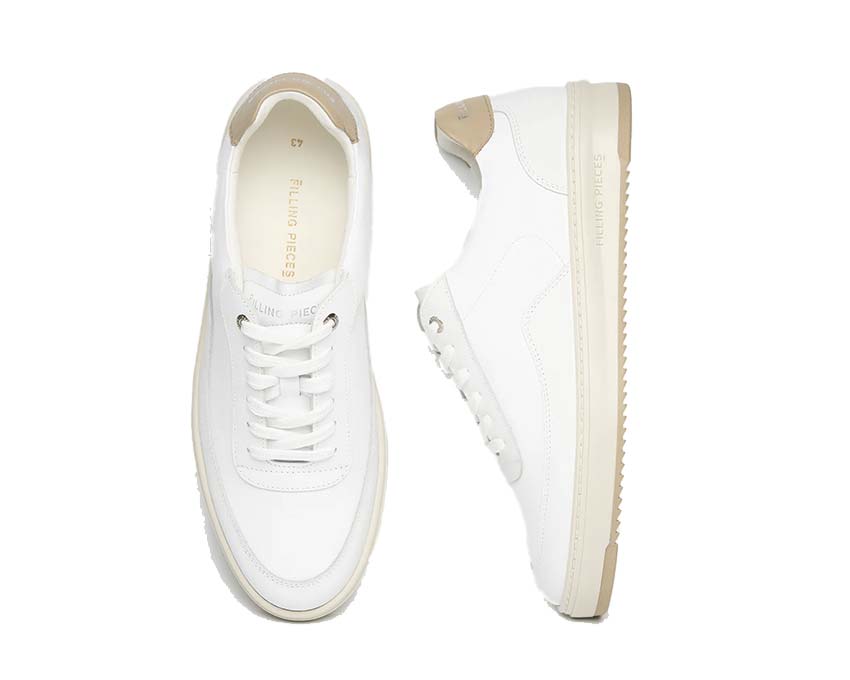 Filling Pieces Mondo Crumbs Cream detail — embroidered tongue Filling Pieces logo