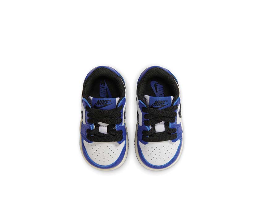 Jordan 1 Retro Low OG White Game Royal detail — vintage leather kids