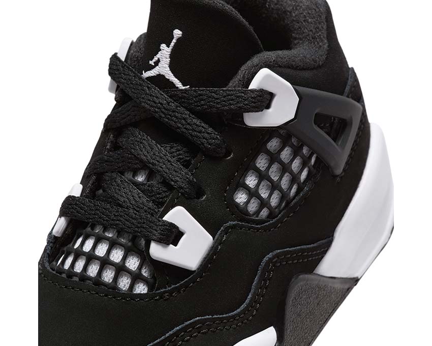 Jordan 4 Retro TD Black vue latérale — cuir noir enfant Jordan 4
