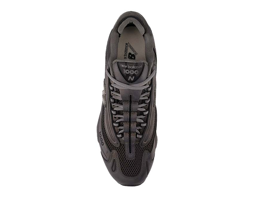 New Balance 1000 Black Metallic suela — suela trail grip