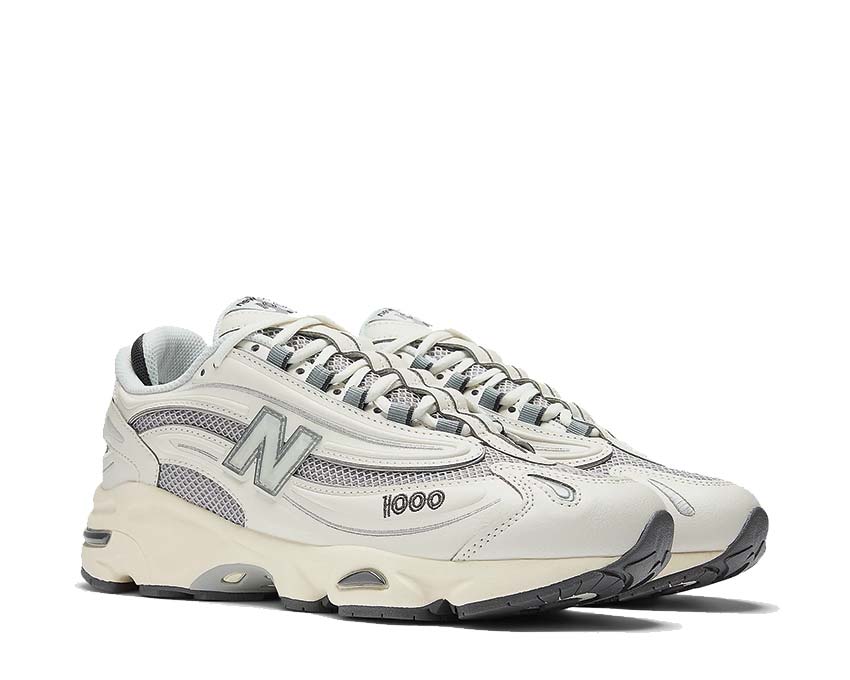 New Balance 1000 Sea Salt vista lateral — parte superior de cuero y mesh transpirable
