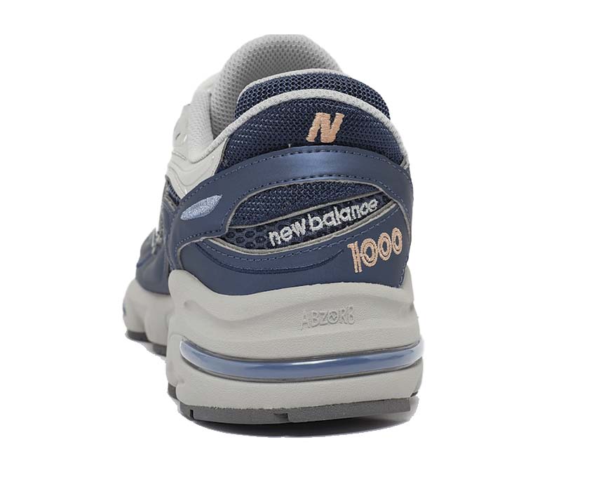 New Balance 1000 Vintage Indigo detalle — superposiciones de ante y bordado N vintage