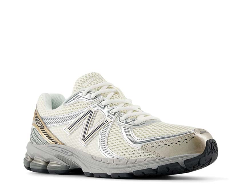 New Balance 860v2 Sea Salt Gold Metallic vista lateral — perfil vintage