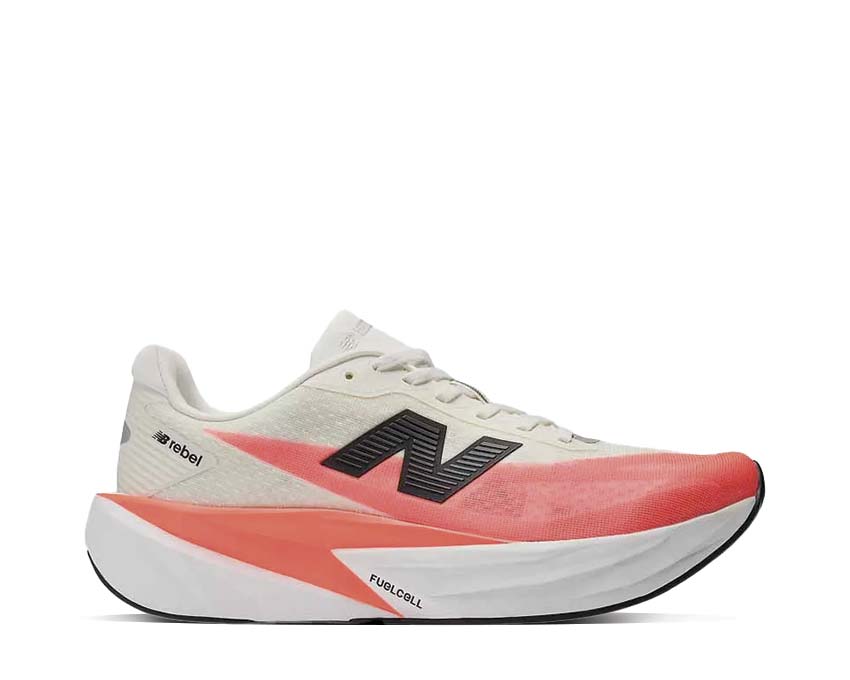 New Balance FuelCell Rebel v5 Urgent Red/White — zapatilla running dinámica colorida