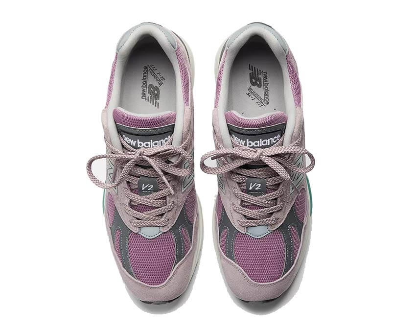 New Balance 991v2 Polignac détail — empiècements cuir et suède violet intense