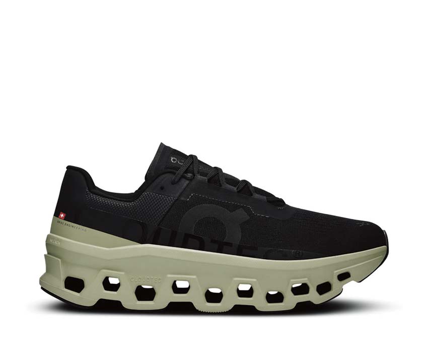 On Cloudmonster Black/Acacia — zapatilla running hombre CloudTec amortiguación larga distancia