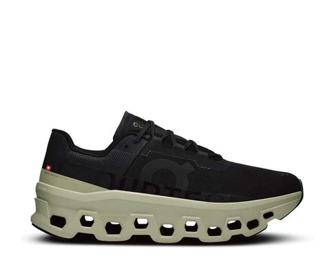On Cloudmonster Black/Acacia — zapatilla running hombre CloudTec amortiguación larga distancia