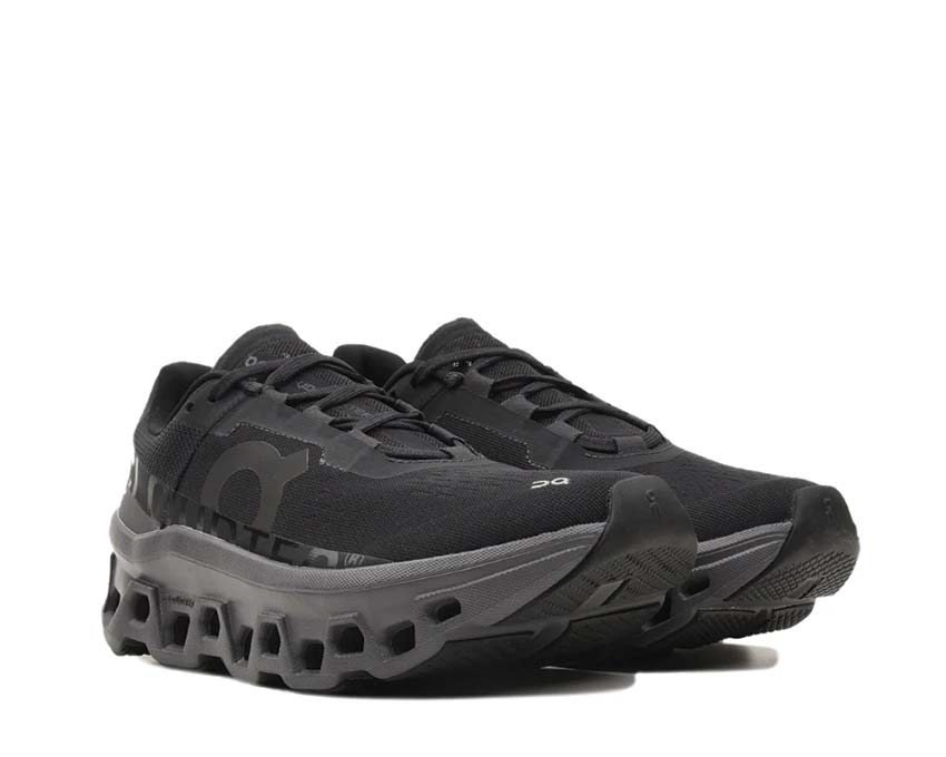 On Cloudmonster W Black/Magnet vue latérale — profil amorti running femme