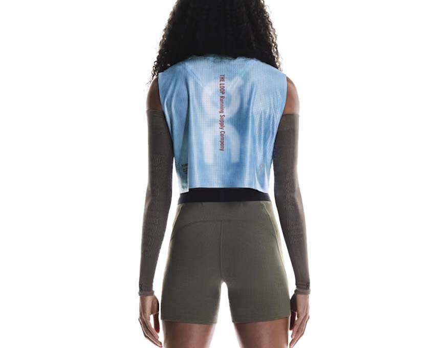 On Tights PLEASURES x The Loop Olive porté dos — poches arrière collant running femme