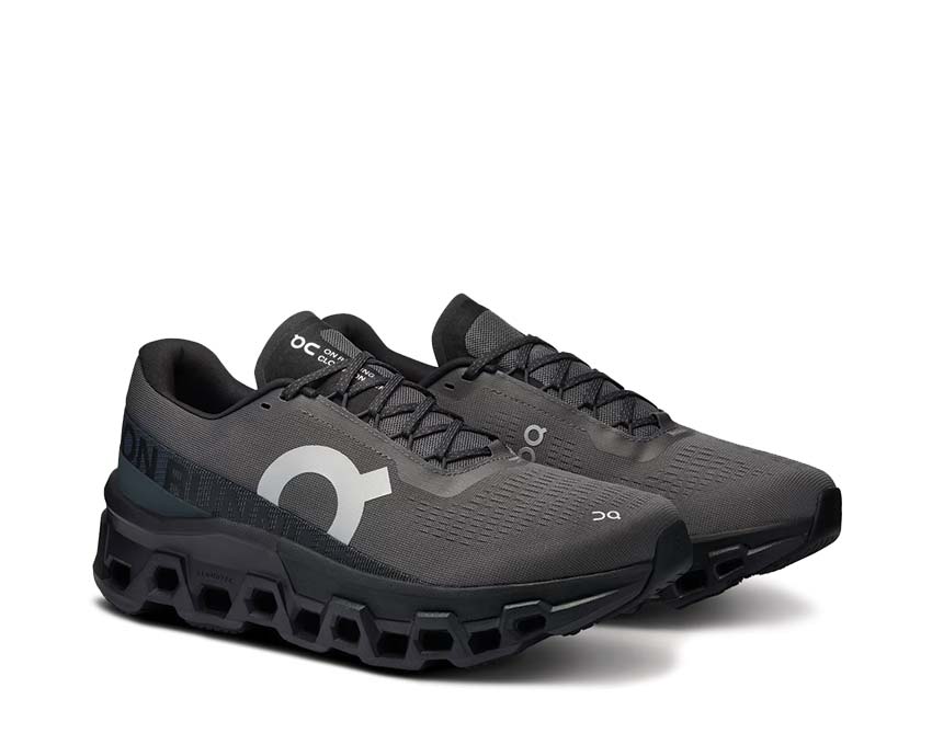 On Cloudmonster 2 Asphalt/Iron vue latérale — profil amorti running homme