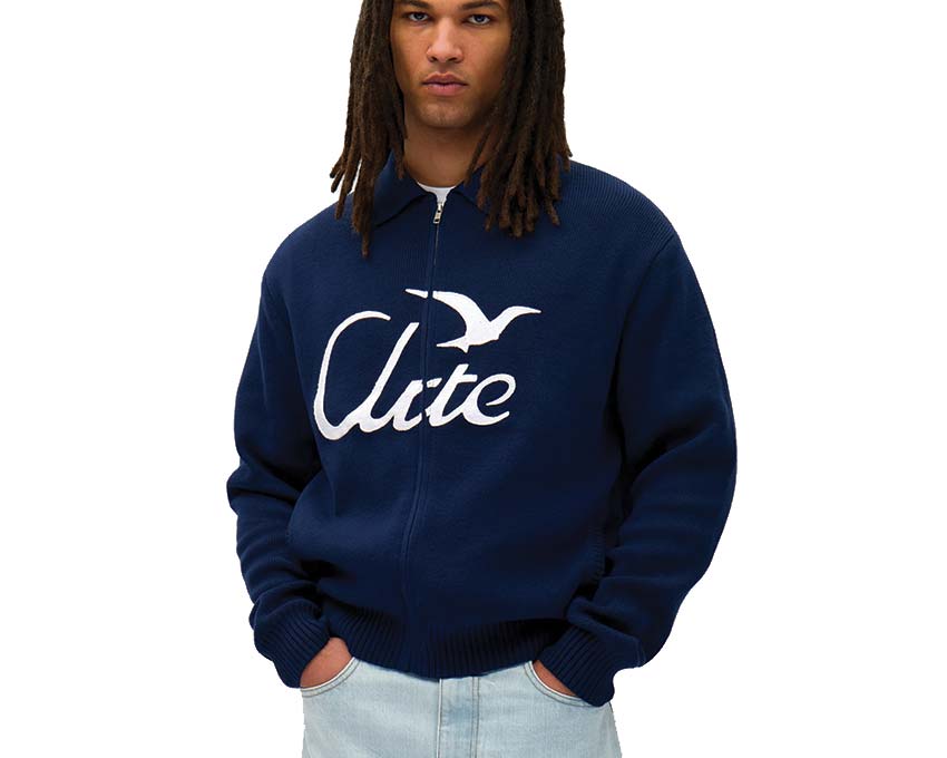 Arte Bird Logo Knit Navy vista lateral — punto fino logo bordado