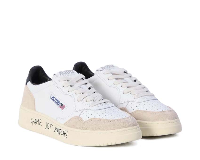 Autry Medalist Low Match White Black vista lateral — ante bicolor blanco y negro
