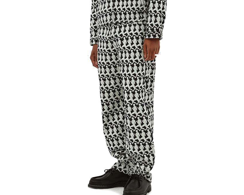 Arte Jones Allover Pants Navy Seitenansicht — grafisch bedruckter Stoff