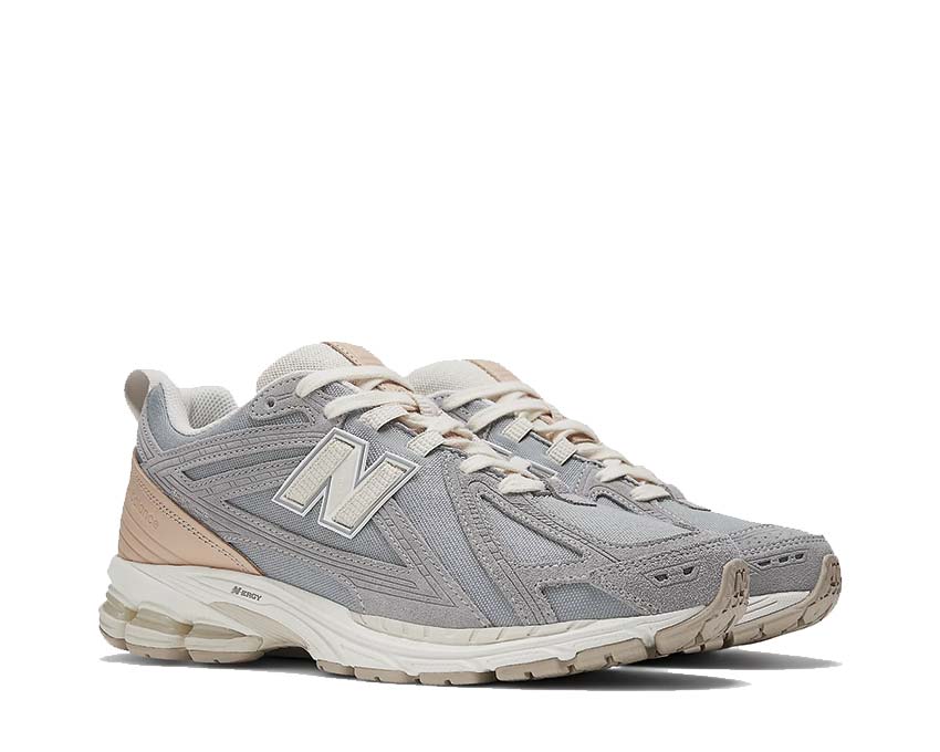 vue latérale — New Balance 1906 gris beige tige mesh suède