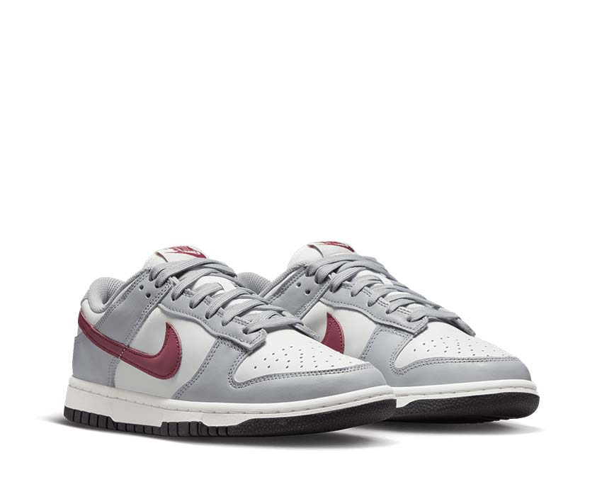 Nike Dunk Low Black White vue latérale — cuir lisse bicolore