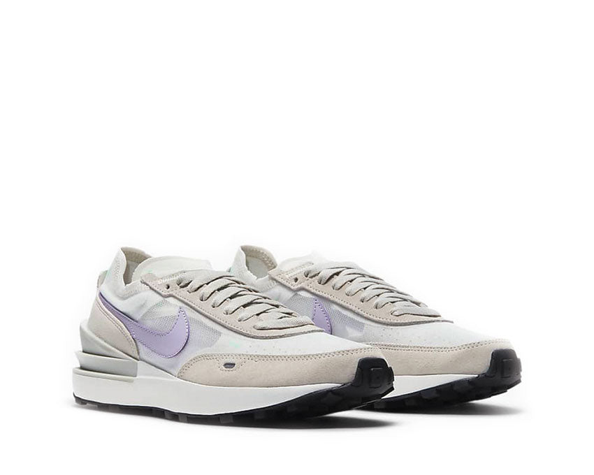 Nike Waffle One Light Bone Summit White vista lateral — parte superior textil ligera